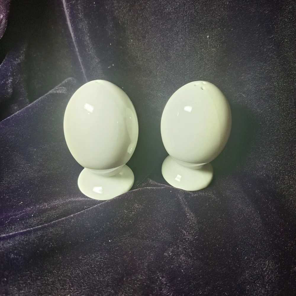 Porcelain white salt and pepper eggs